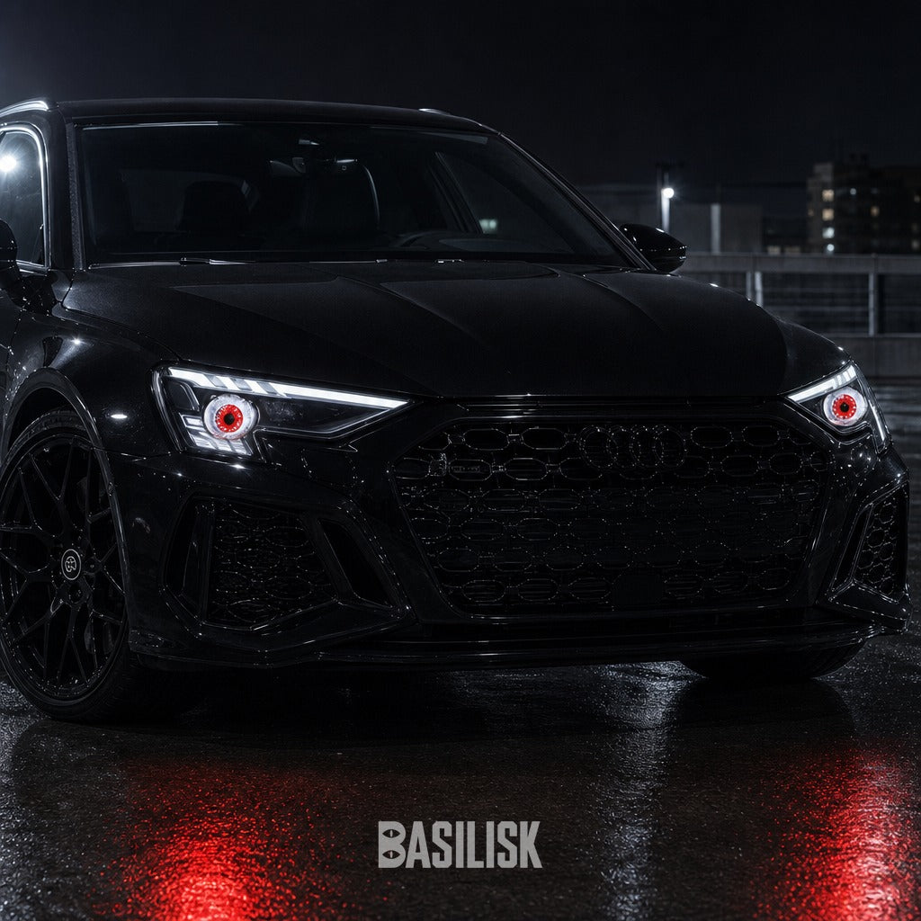 Audi RS3 at night with BASILISK demon eyes lit in both headlights