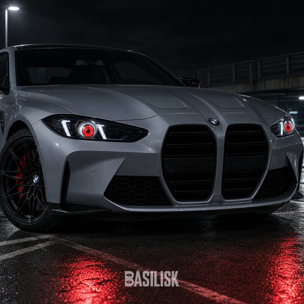 BMW M4 at night with BASILISK demon eyes lit in both headlights