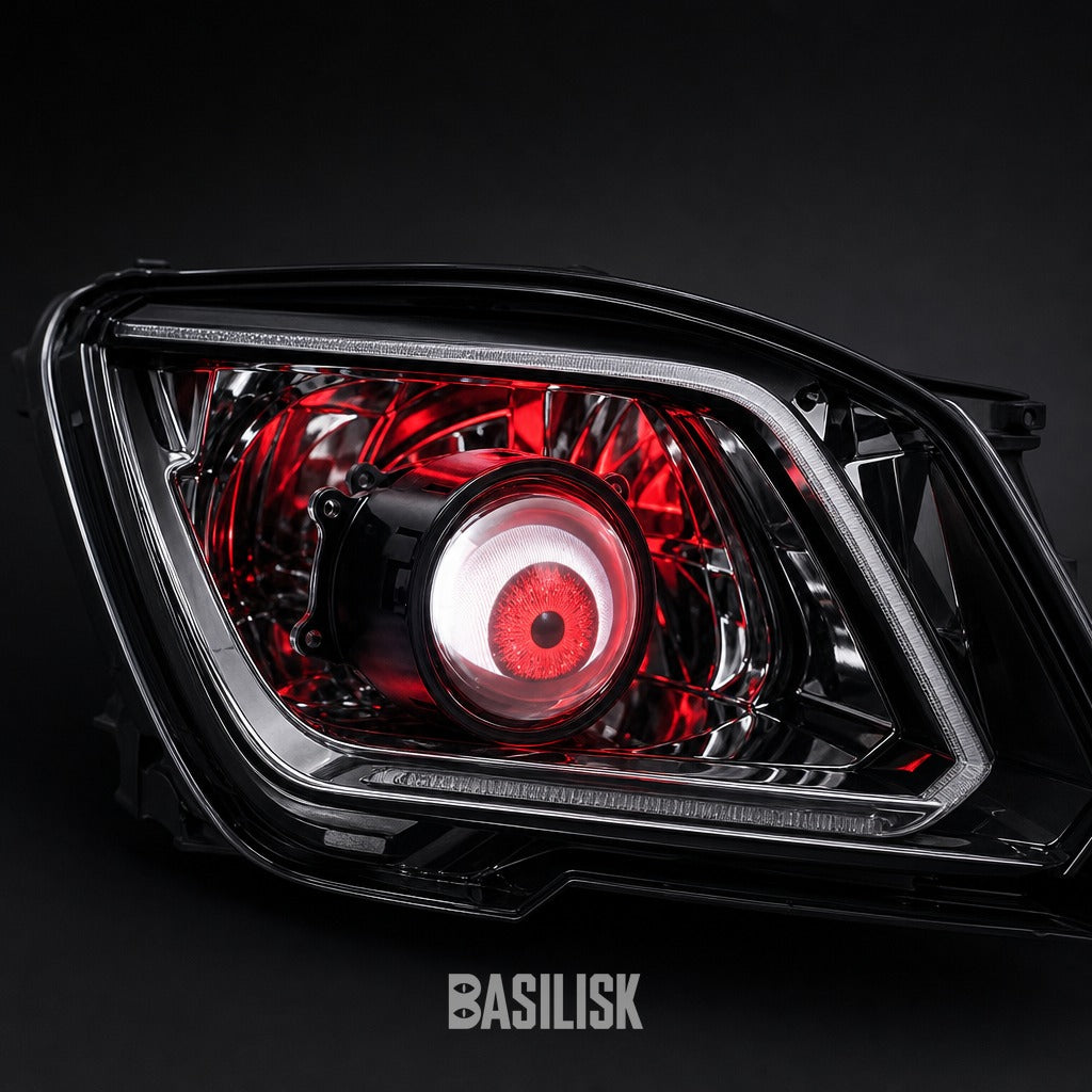 Projector lens seated inside a headlight housing, lit red